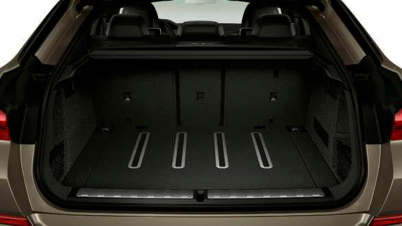 Пристосування для розміщення речей в салоні.